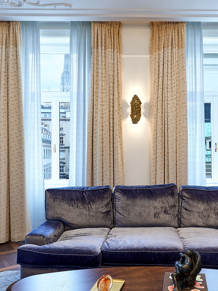 Interior detail photograph featuring a sculptural object in a hotel suite